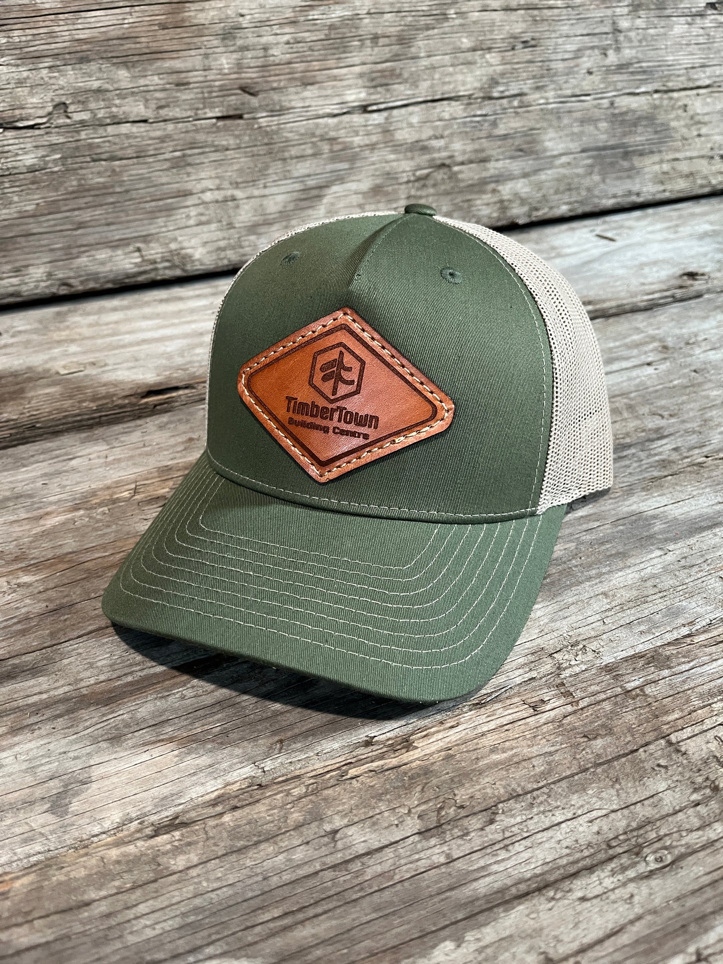 Ball cap with custom leather patch