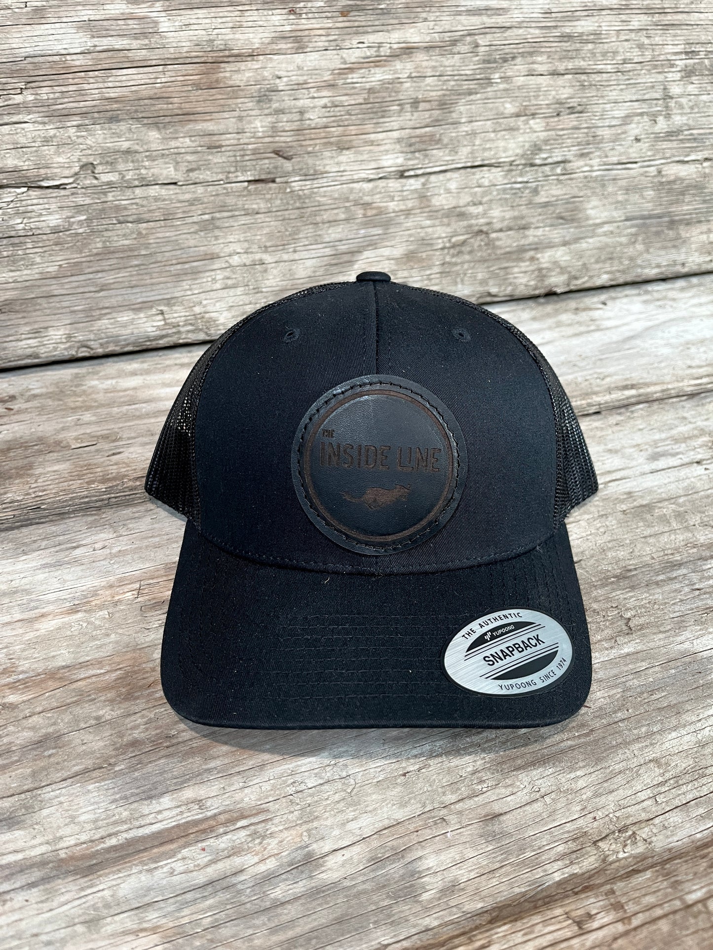Ball cap with custom leather patch